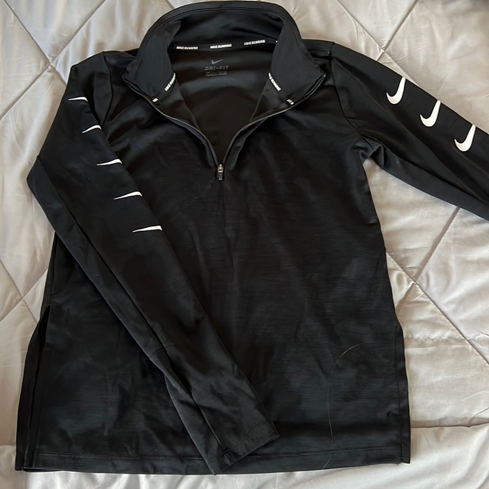 Black Nike running dri-fit long sleeve. With nike checks down the side of sleeve